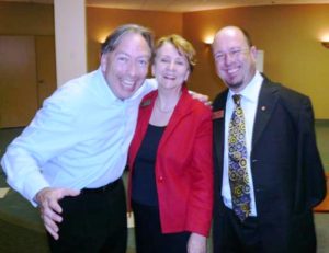 Picture of Patricia with humorist, Michael Kerr and motivational speaker, Alvin Law