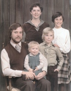 1970s Father, Mother, and three children re family meetings
