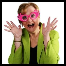 Patricia Morgan wearing silly glasses - her personal sense of humor style is 