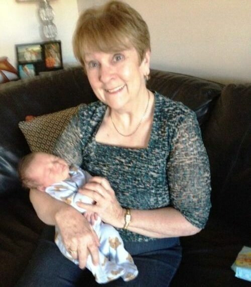 Patricia Morgan holding grandson