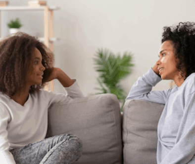Parenting teens depicted by mother daughter chatting