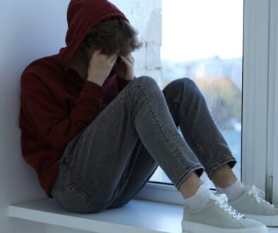 depressed teen in hoody