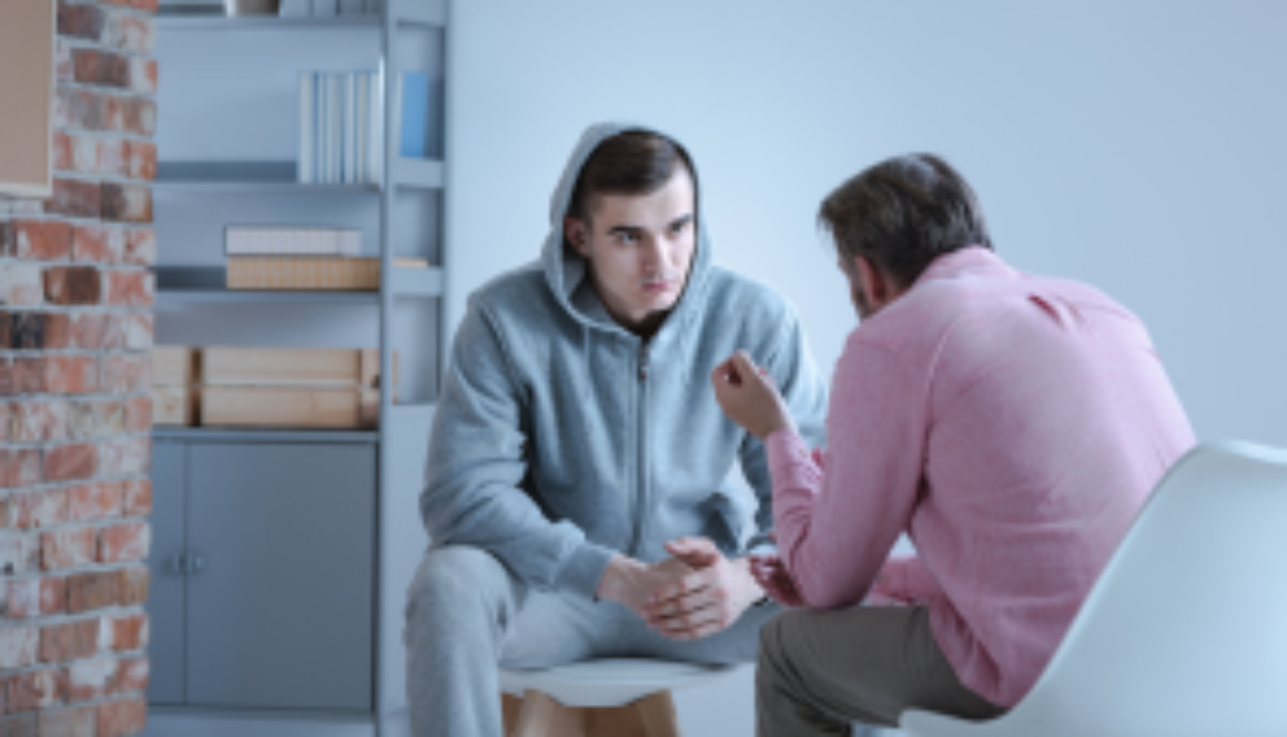two men listening in man therapy